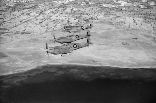 Spitfire LF Mk Vs of No. 244 Wing flying over the Tunisian coast after escorting light bombers on a sortie to Mareth, 23 March 1943.