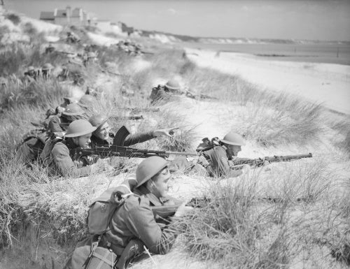 Men of 7th Battalion, The Green Howards on an exercise among the sand dunes at Sandbanks, near Poole in Dorset, 31 July 1940.