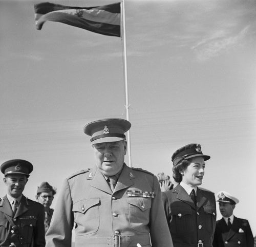 Winston Churchill with his daughter Sarah, on a visit to his old regiment, the 4th Queen's Own Hussars, in Egypt, 5 December 1943.