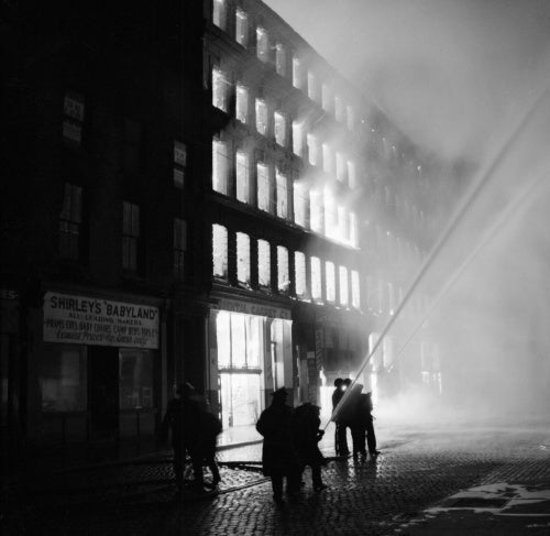 Buildings burning in Manchester after a German air raid on the night of 3 December 1940.