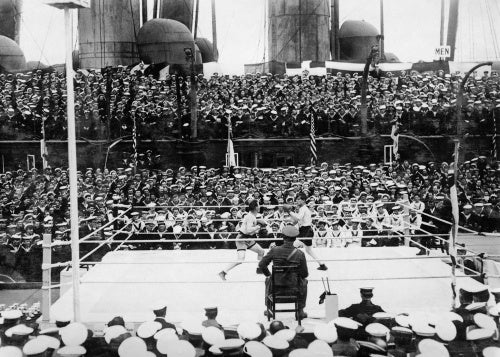 A Middleweight bout at the Grand Fleet Boxing Tournament in 1918 between Chief Carpenter's Mate Gartner (US Navy) and Leading Stoker Roberts (Royal Navy).