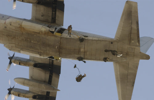 Paratroopers of 1st Battalion, The Parachute Regiment, jumping from an American C-130 Hercules in Kuwait, during training for operations in Iraq, 16 March 2003.