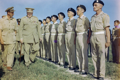 Winston Churchill inspecting men of the 4th Queen's Own Hussars at Loreto aerodrome, Italy, 25 August 1944.