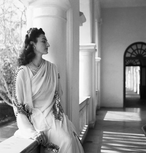 Political Personalities: Three quarter length portrait of Princess Durri Shehvar Berar, only daughter of the former Sultan of Turkey, photographed wearing a jewelled sari in India.