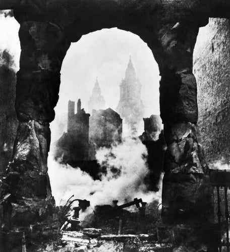 The western bell towers of St Paul's Cathedral in London seen through an archway after the heavy incendiary raid of 29 December 1940.