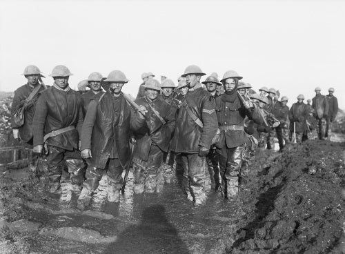 Working party of British troops on muddy ground near Bernafay Wood, Somme, November 1916