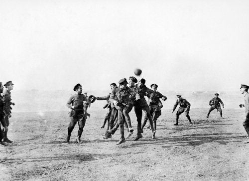 Officers and men of 26th Divisional Ammunition Train (Army Service Corps) playing football in Salonika, Christmas 1915.